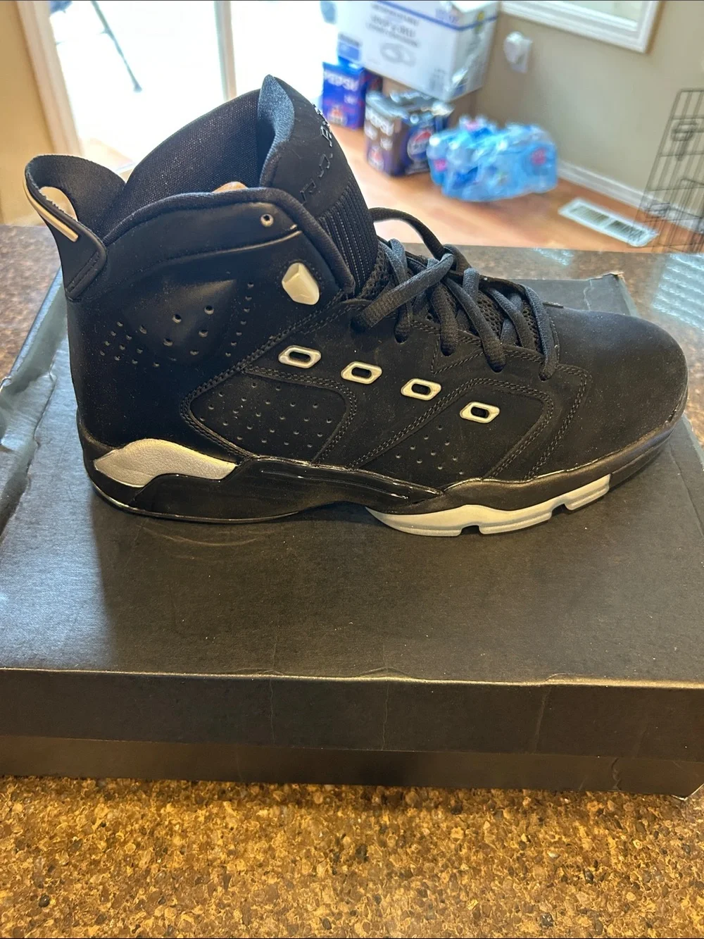 Jordan 6-17-23 Black High-Top Athletic Sneaker with Silver Accents